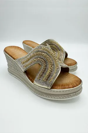 Hestia Diamante Strap Wedge Mules in Gold