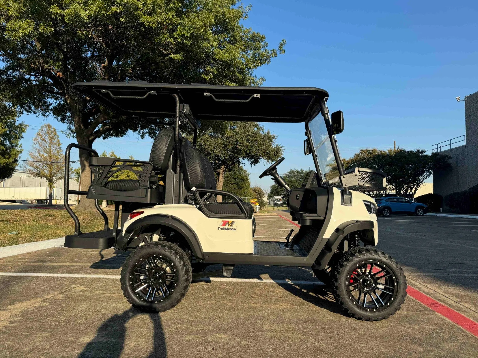 Trailmaster TBM X4, 48V Electric Golf Cart, Four Passenger, Electromagnetic Braking, Custom Rims, Lifted, Ground Effects LED lights, 10.5 LED Display, 48 Mile range, High/Low Trans